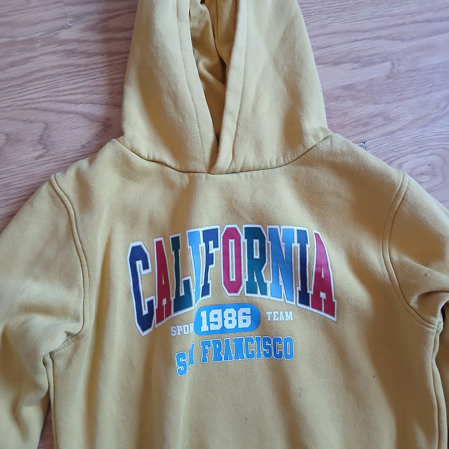 Dunnes Yellow California Jumper Age 10-11