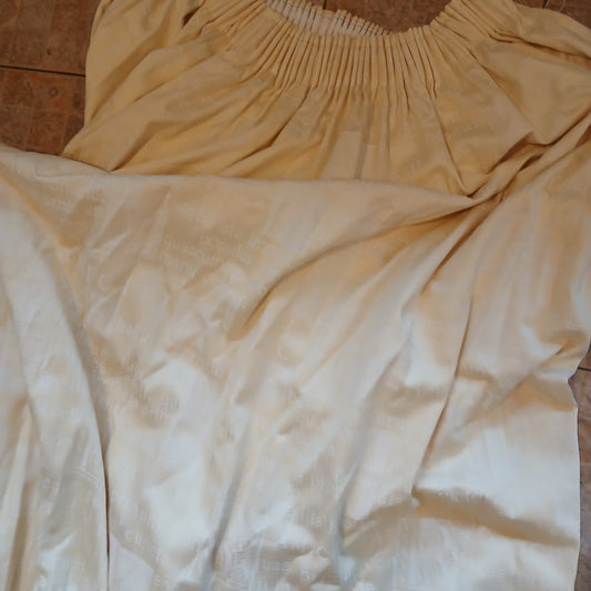 Gina.G Pair of Cream Curtains