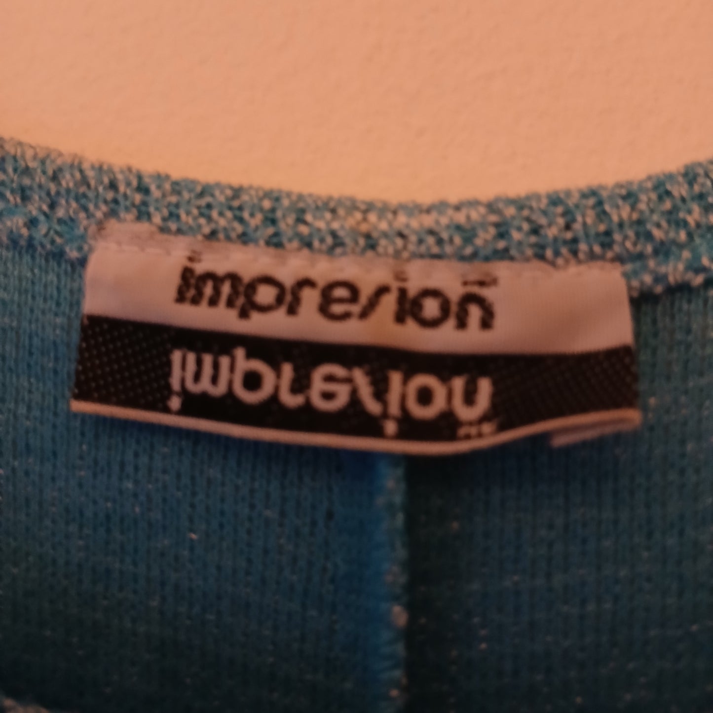 Impresion Turquoise Batwing Top Approx Size M